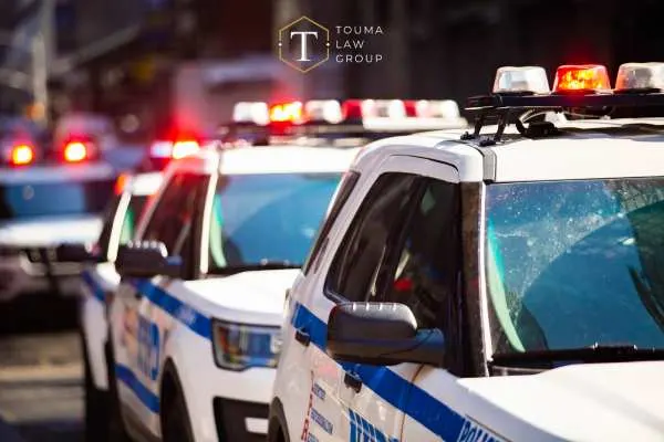 Three police patrol cars